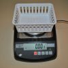 Scale with a basket on top after taring