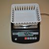Scale with a basket on top in weigh mode